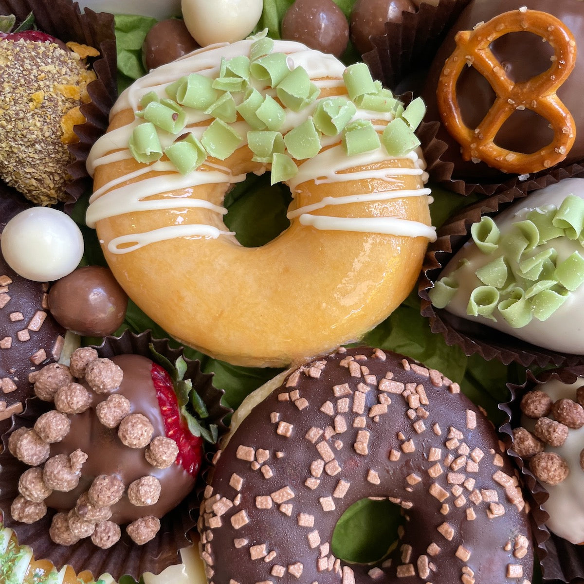 Gourmet donuts & chocolate strawberries - a delectable gift for all occasions.
