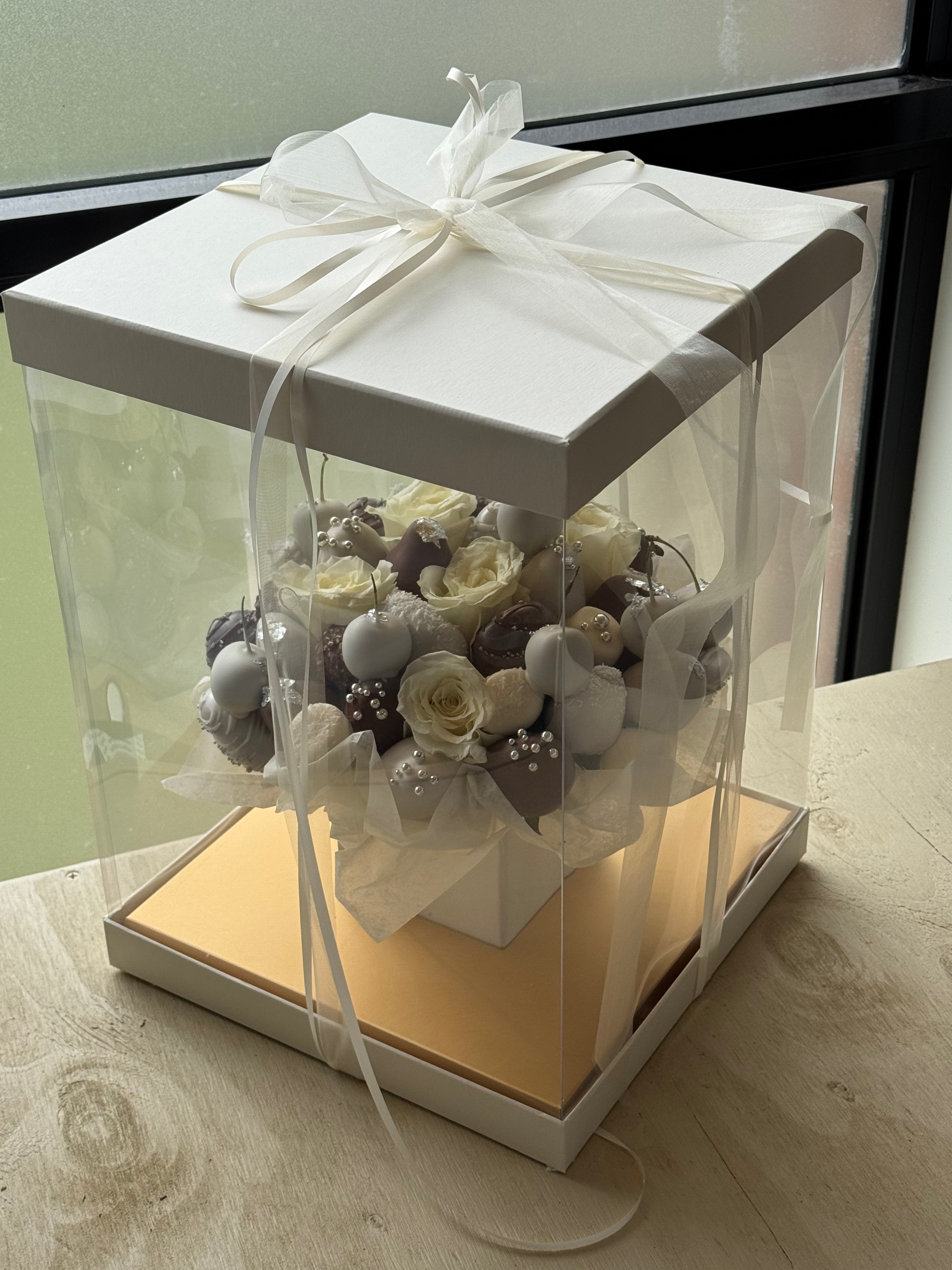 Romantic diamond chocolate strawberry bouquet displayed in signature Aquarium Box