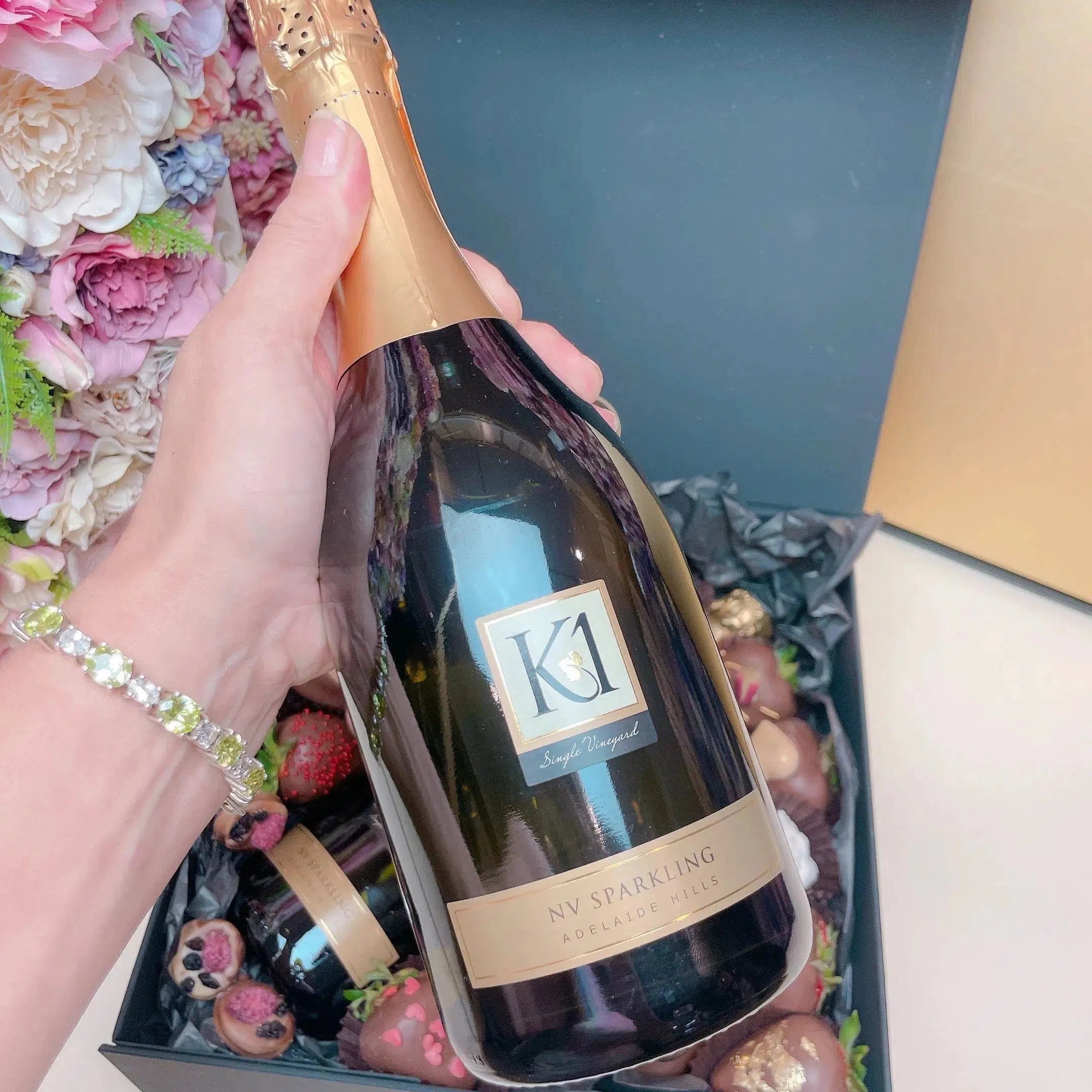 Get your Hamper Box with Same-Day Delivery in Adelaide, Surprise your special someone on Valentine's Day with our exquisite Hamper Box. Our extraordinary selection of the finest local strawberries, freshly baked donuts and the iconic 750ml bottle of Sparkling K1 NV Bottle