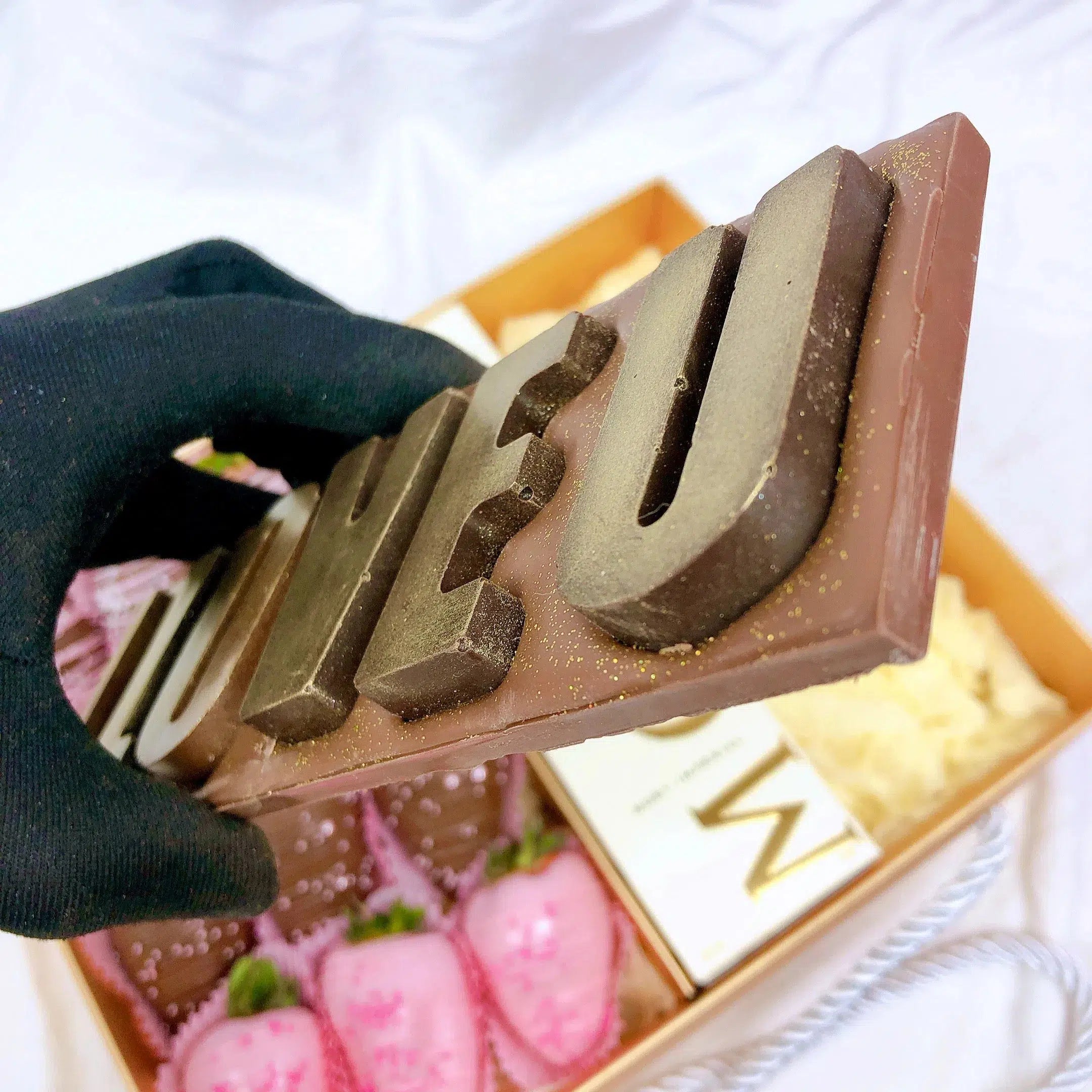 Chocolate covered strawberries bottle of champagne and solid chocolate bar with lettuce I Love you same day delivery
