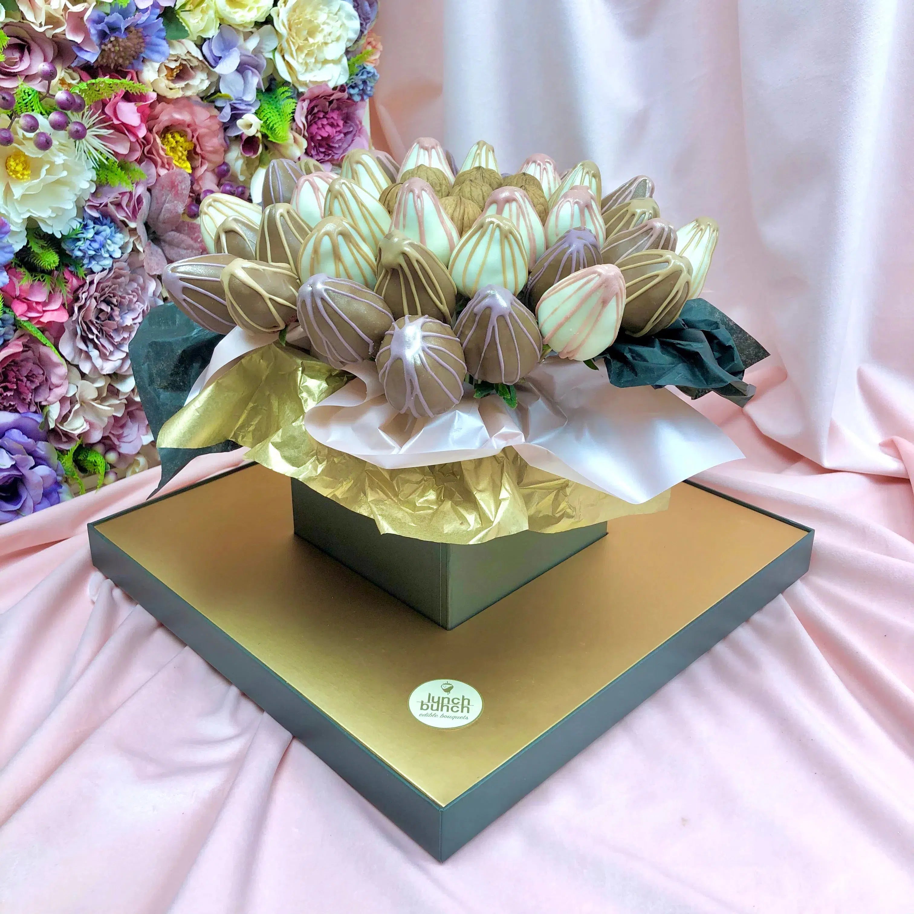 Milk chocolate covered strawberries and white chocolate covered strawberries bouquet fresh walnuts in a gift box seen the delivery order online