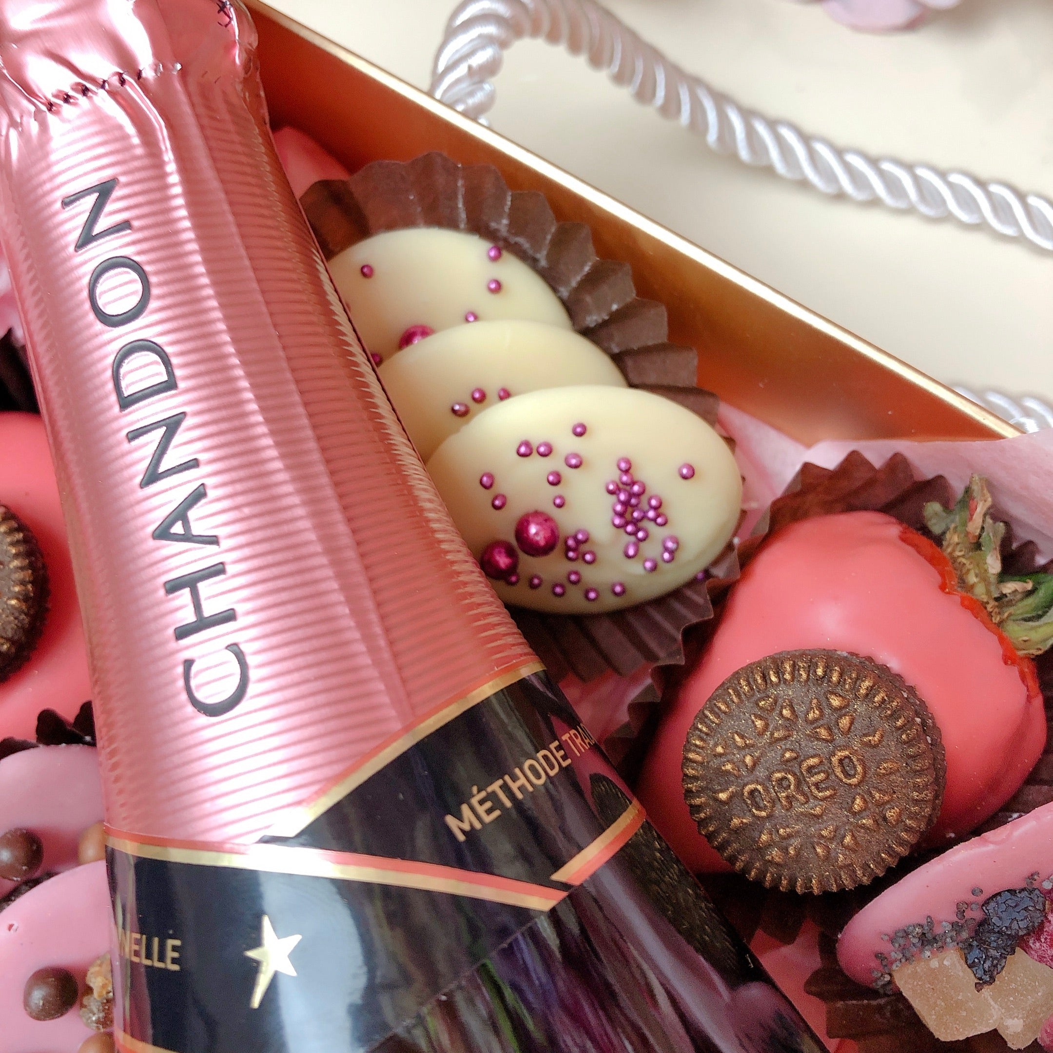 Luxury champagne hamper with chocolate strawberries and mini doughnuts