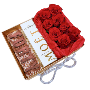 40's Birthday Gift Hamper has a thick solid block of chocolate letters and paired with a bottle of Moet Champaign and Roses 40th birthday ideas