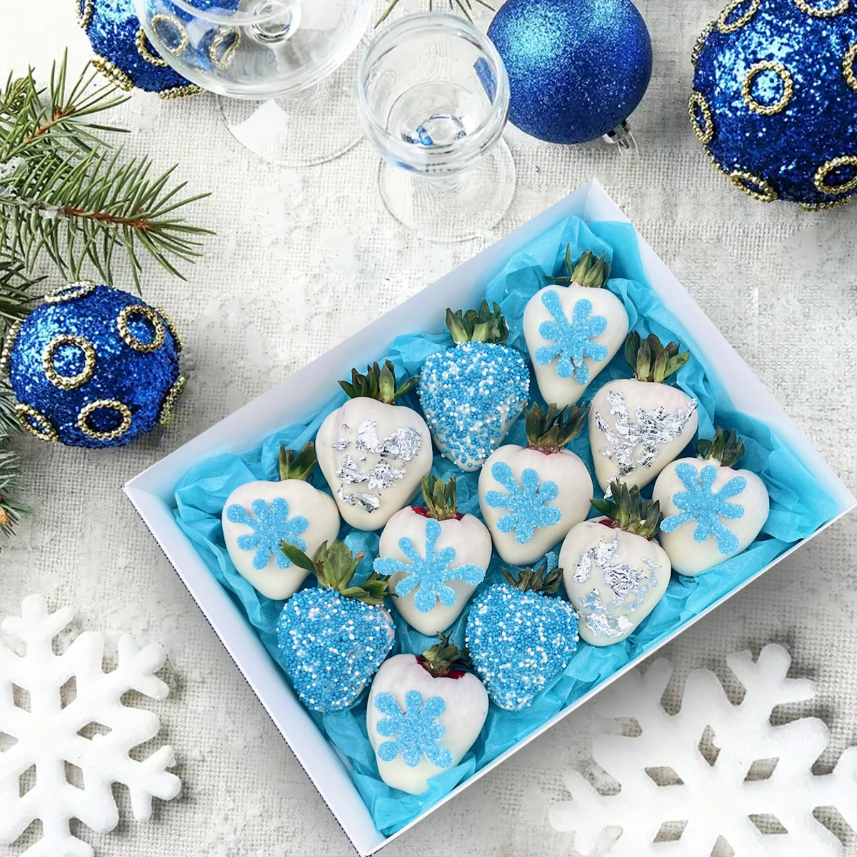Christmas Gift Box, Blue chocolate, snowflakes, and strawberries covered in white chocolate. 