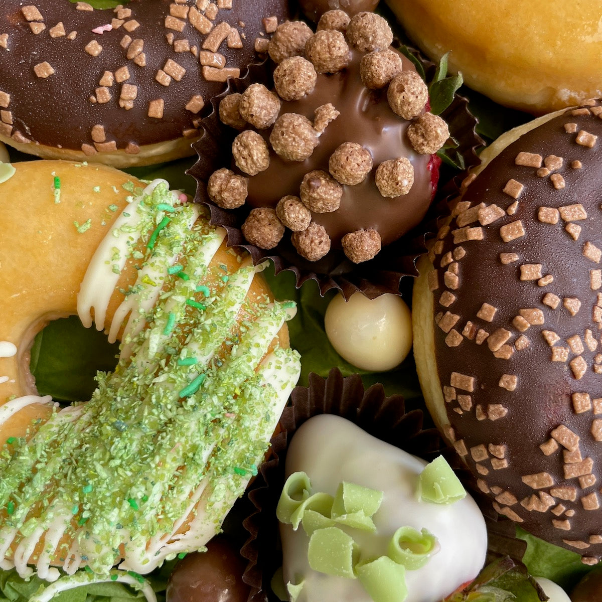 Heavenly donuts & chocolate strawberries - the perfect gift for any celebration.