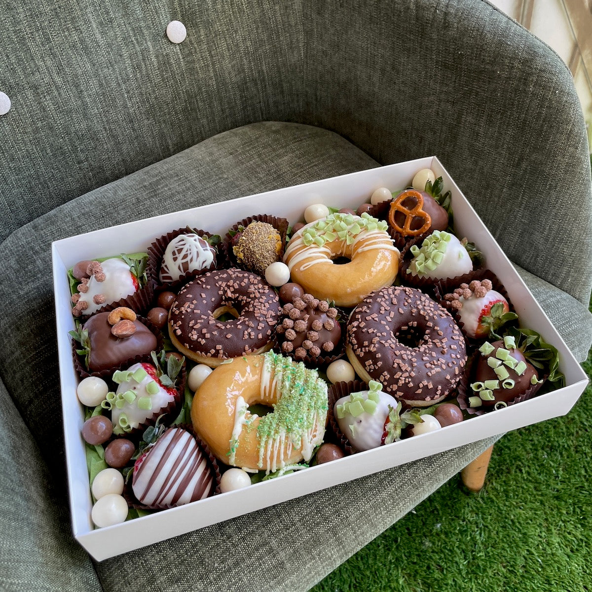 Indulge in our heavenly donuts & chocolate strawberries. A delightful dessert box for any occasion. Order now!