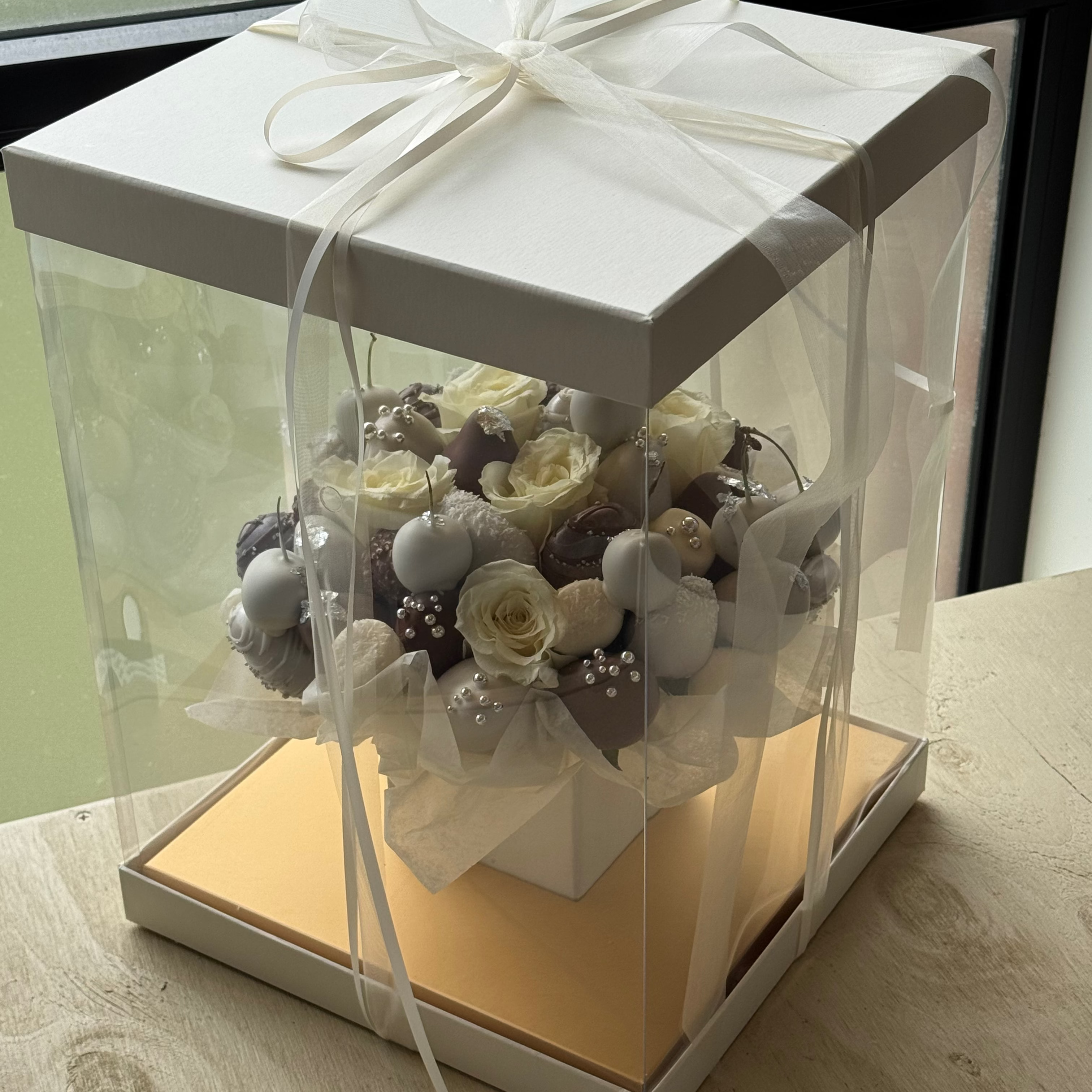 Romantic chocolate strawberry bouquet displayed in signature Aquarium Box
