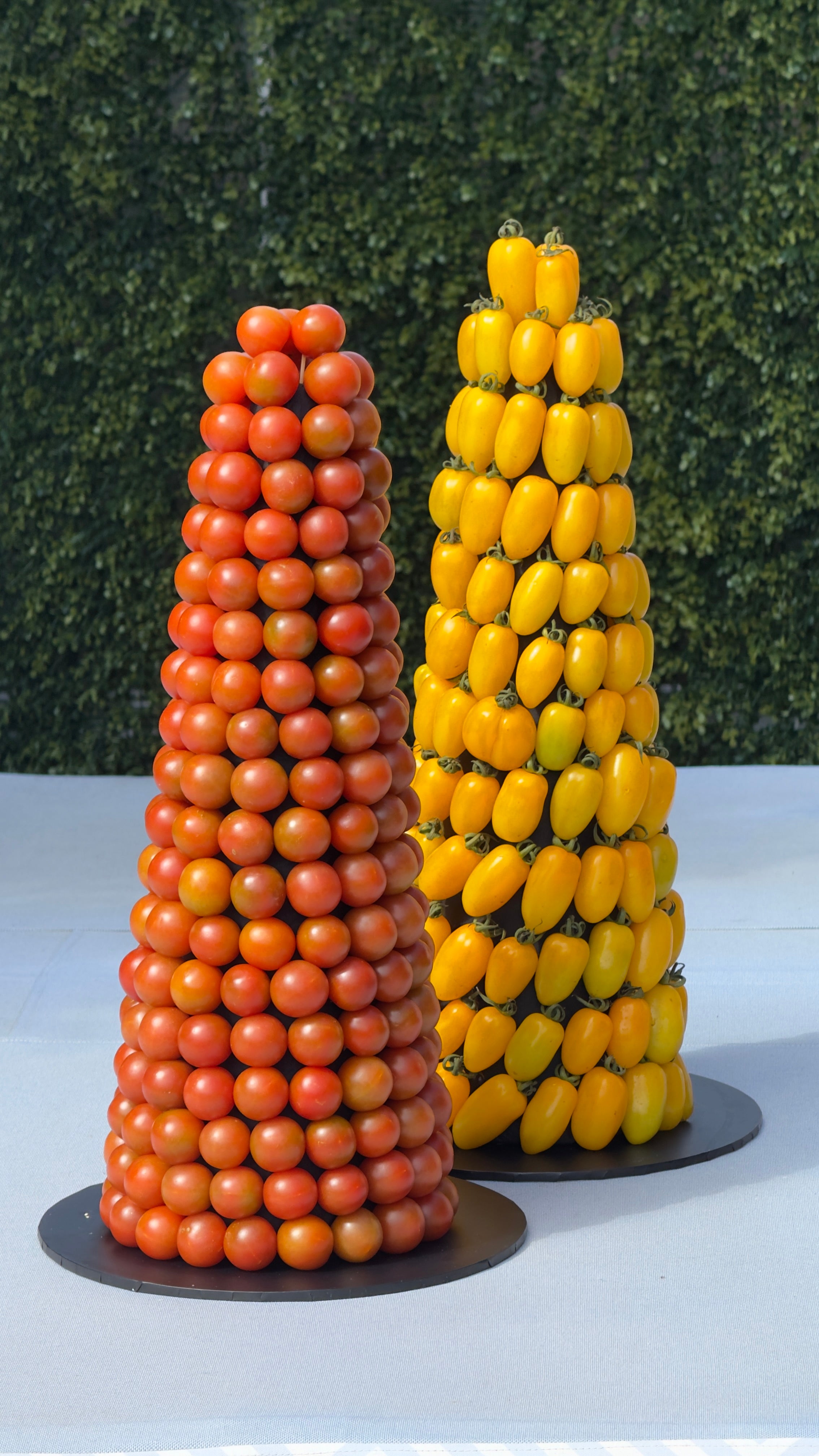 Savoury tomato tower displayed as an appetiser centrepiece