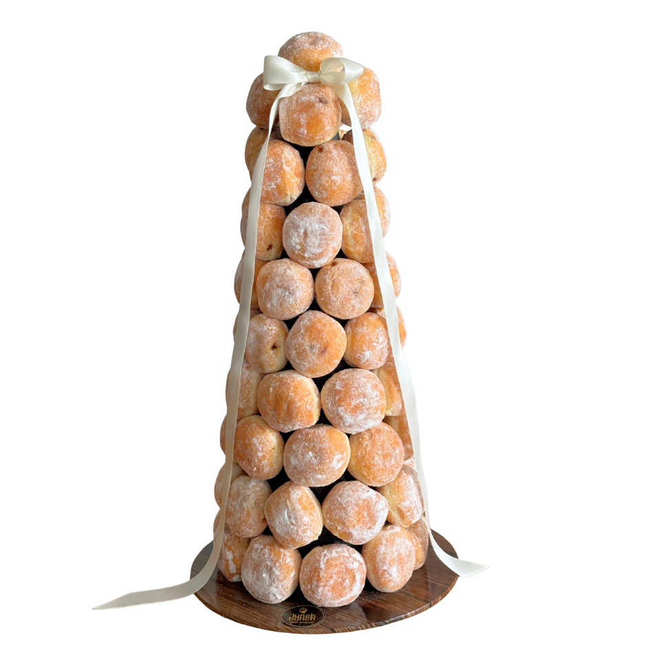 Rustic donut tower made with Nutella and salted caramel bombolini donuts, styled as an event dessert centrepiece for weddings and celebrations in Melbourne and Adelaide