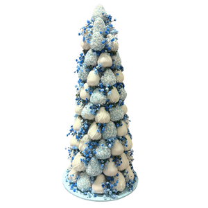 Blue chocolate strawberries with decorative flowers for baby shower dessert table