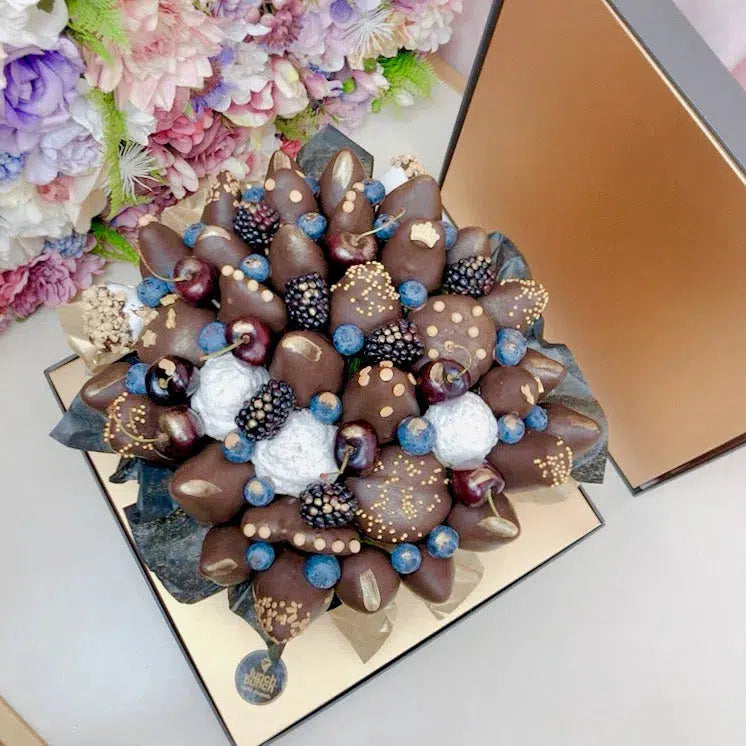 Milk chocolate covered strawberries and doughnuts Bouquet fresh berries in chocolate luxury presentation hamper