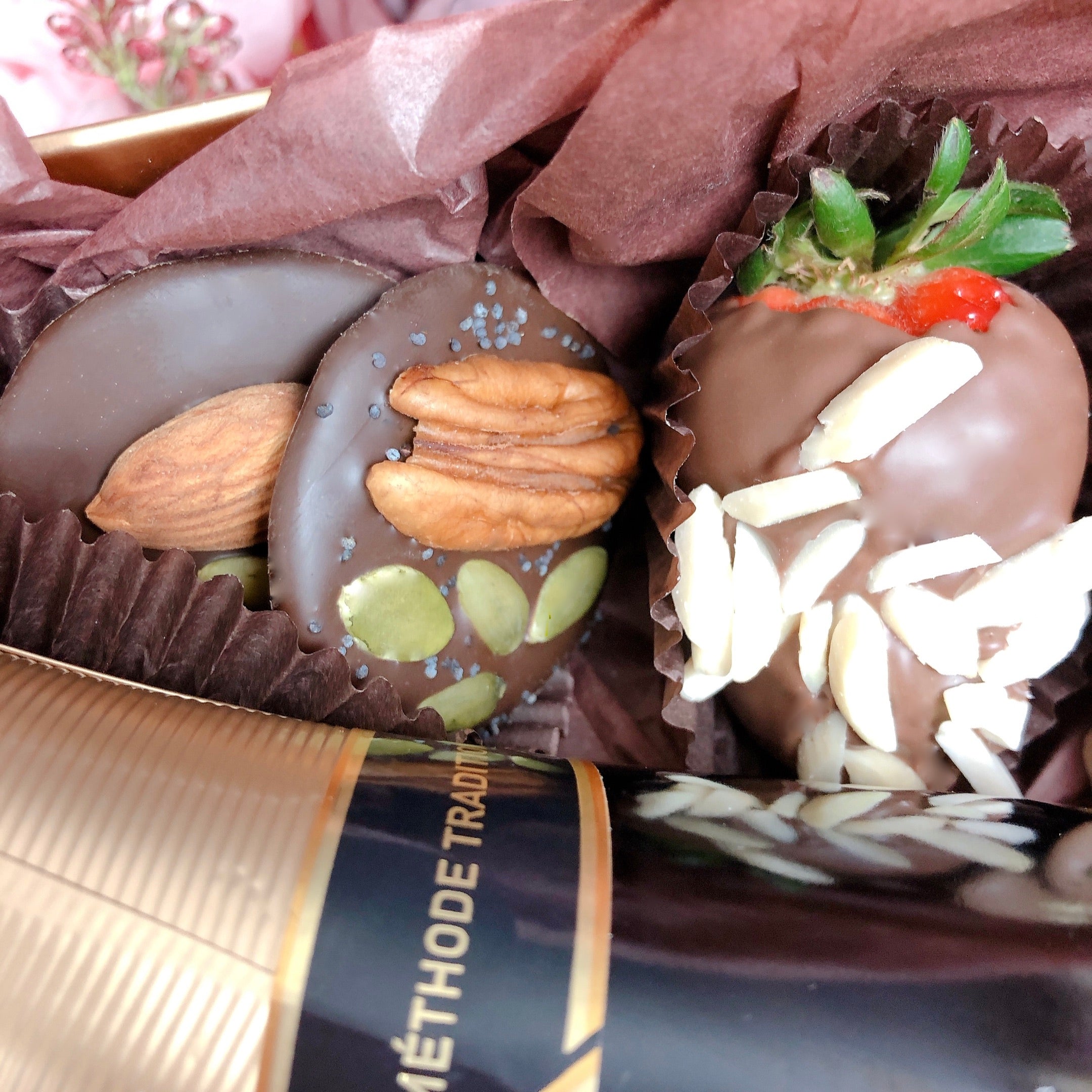 Chocolate covered strawberries and doughnuts in the Luxury chandon champagne hamper box