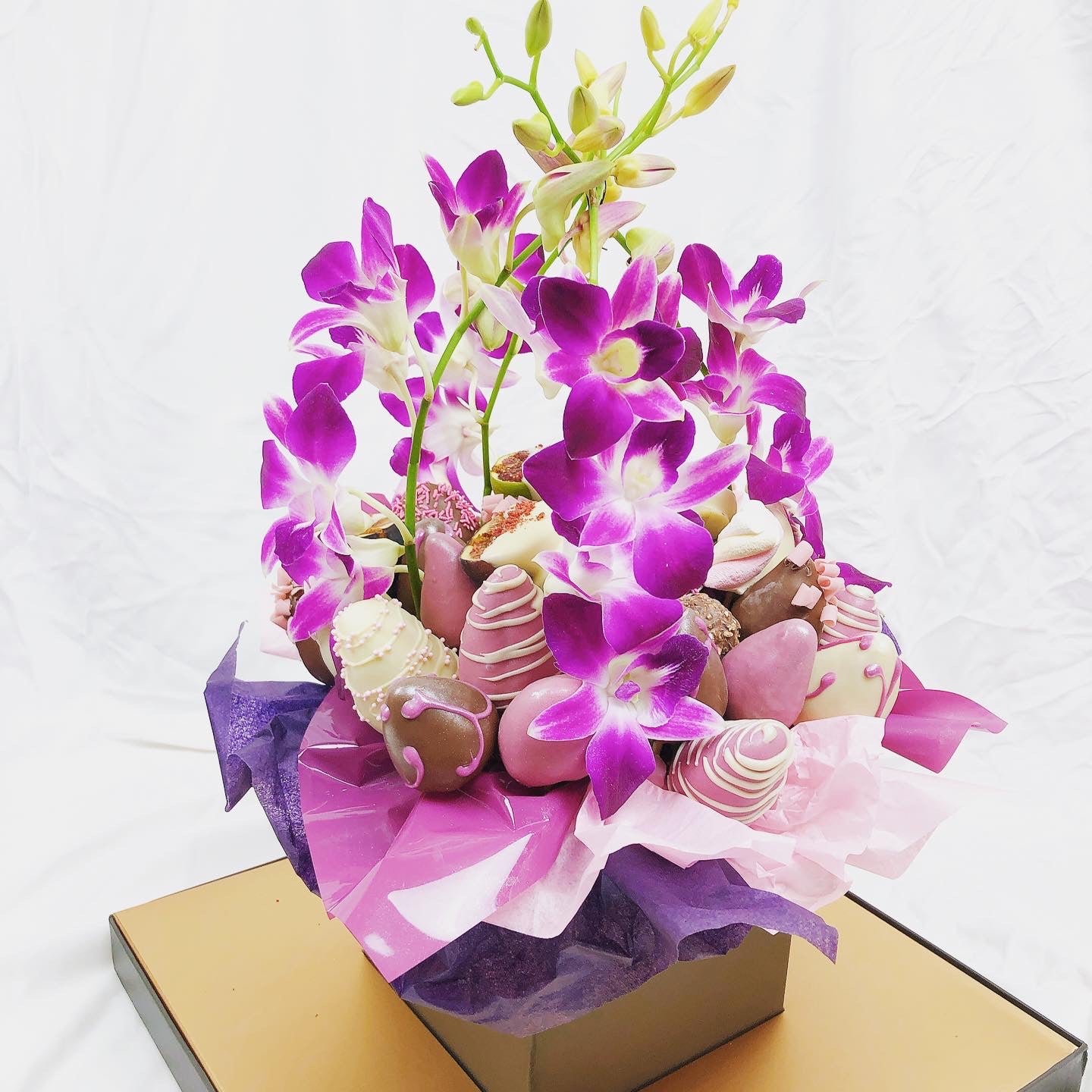 Orchids & Chocolate Strawberries Bouquet fresh fruits Bouquet fruit covered in chocolate berries and flowers gift same day delivery