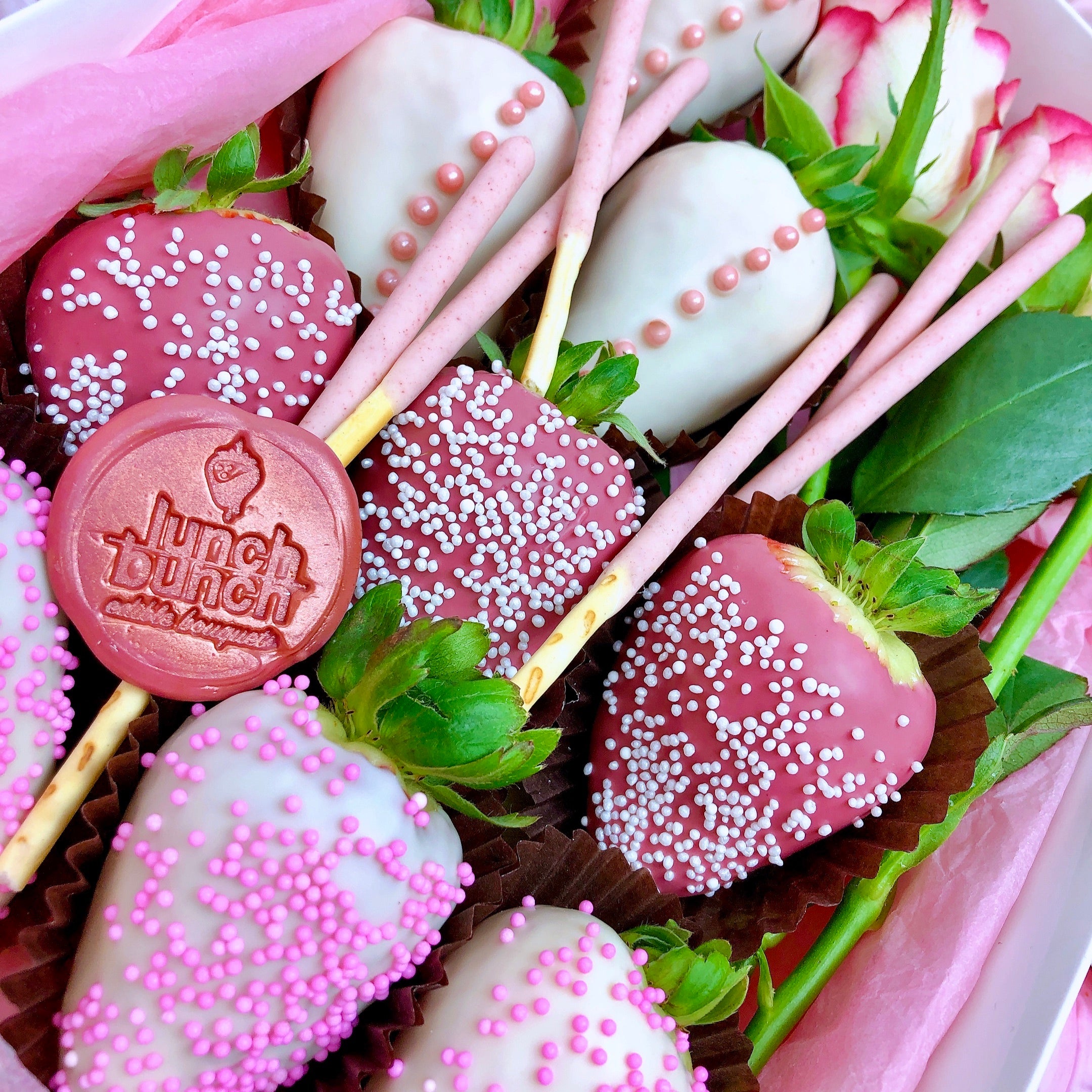 Small gift box of nine chocolate covered strawberries and three roses available for same day delivery Adelaide
