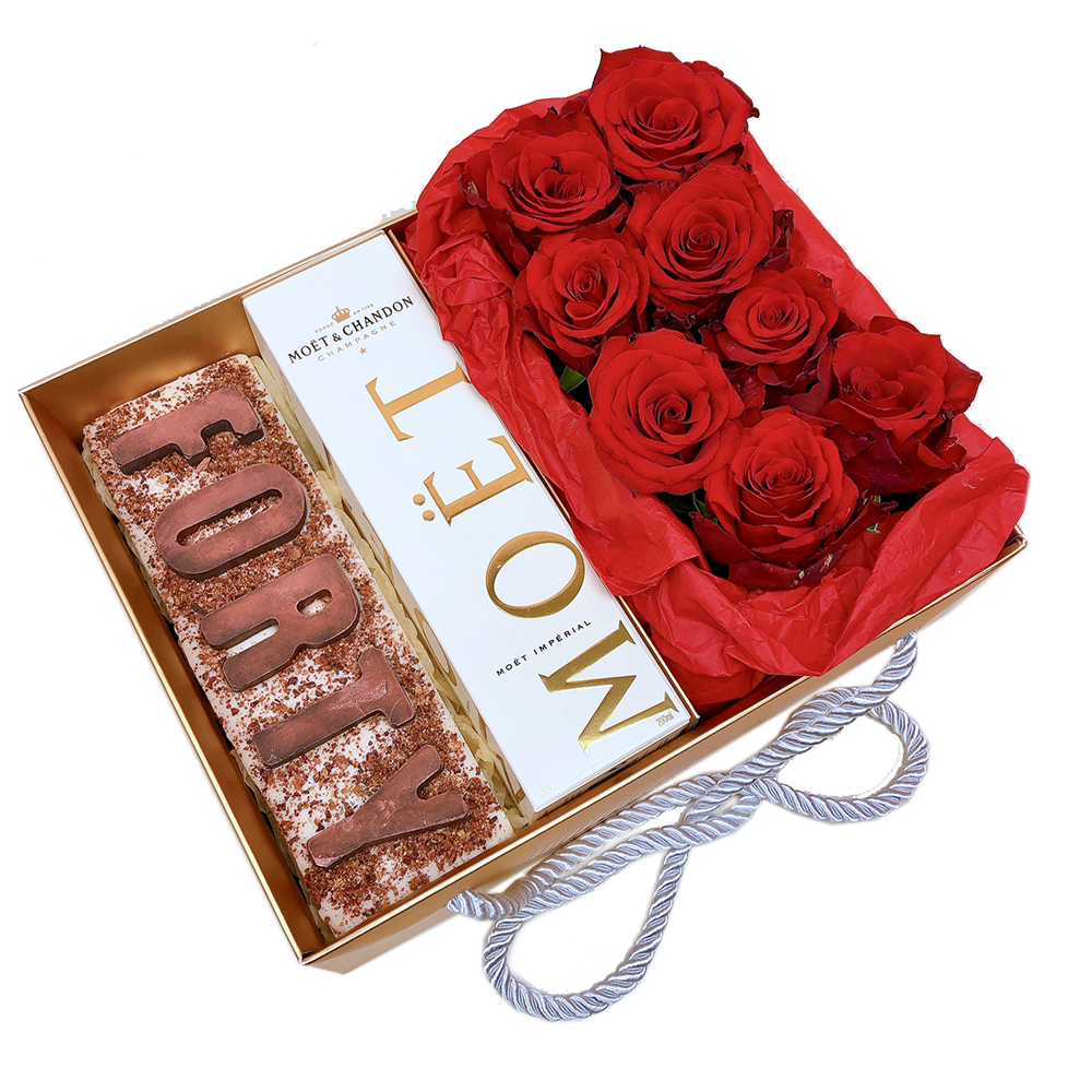40's Birthday Gift Hamper has a thick solid block of chocolate letters and paired with a bottle of Moet Champaign and Roses 40th birthday ideas
