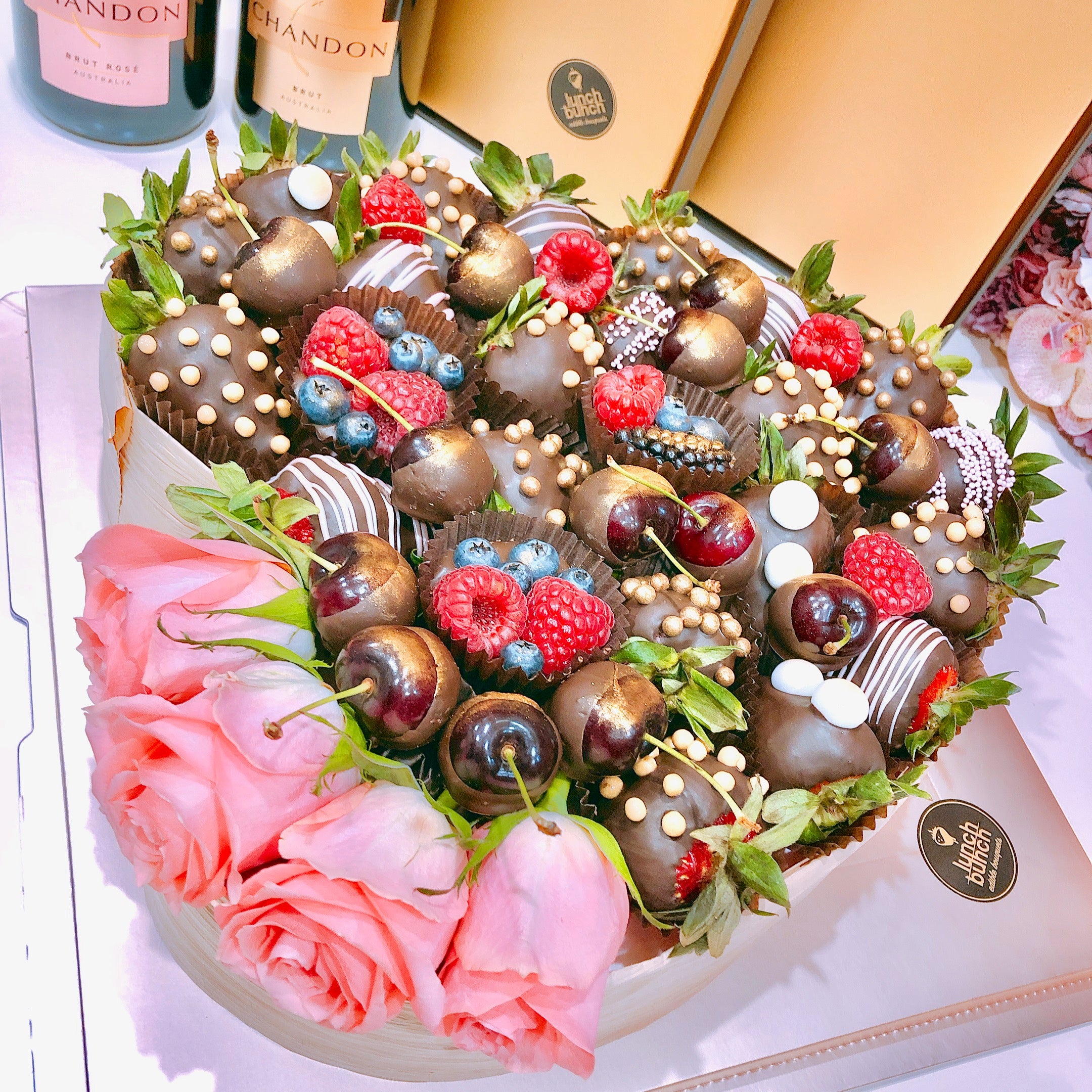 Roses and chocolate covered strawberries in love heart shaped box gift present birthday hamper