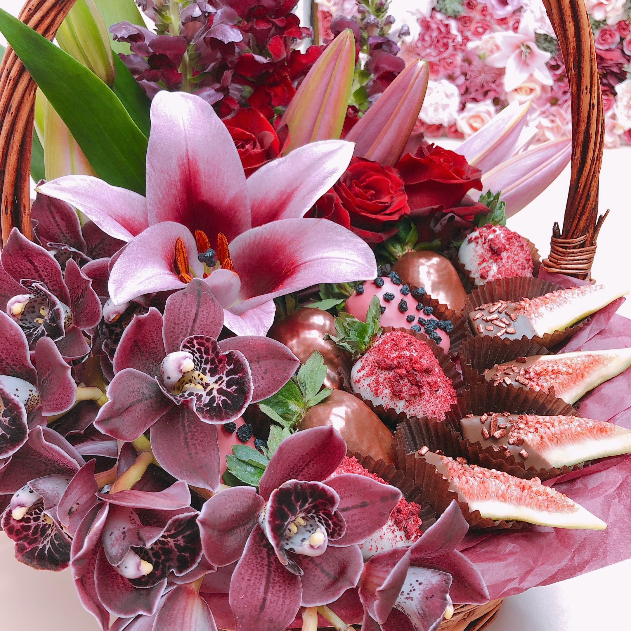 Luxury basket full of handmade chocolate covered strawberries and chocolate figs