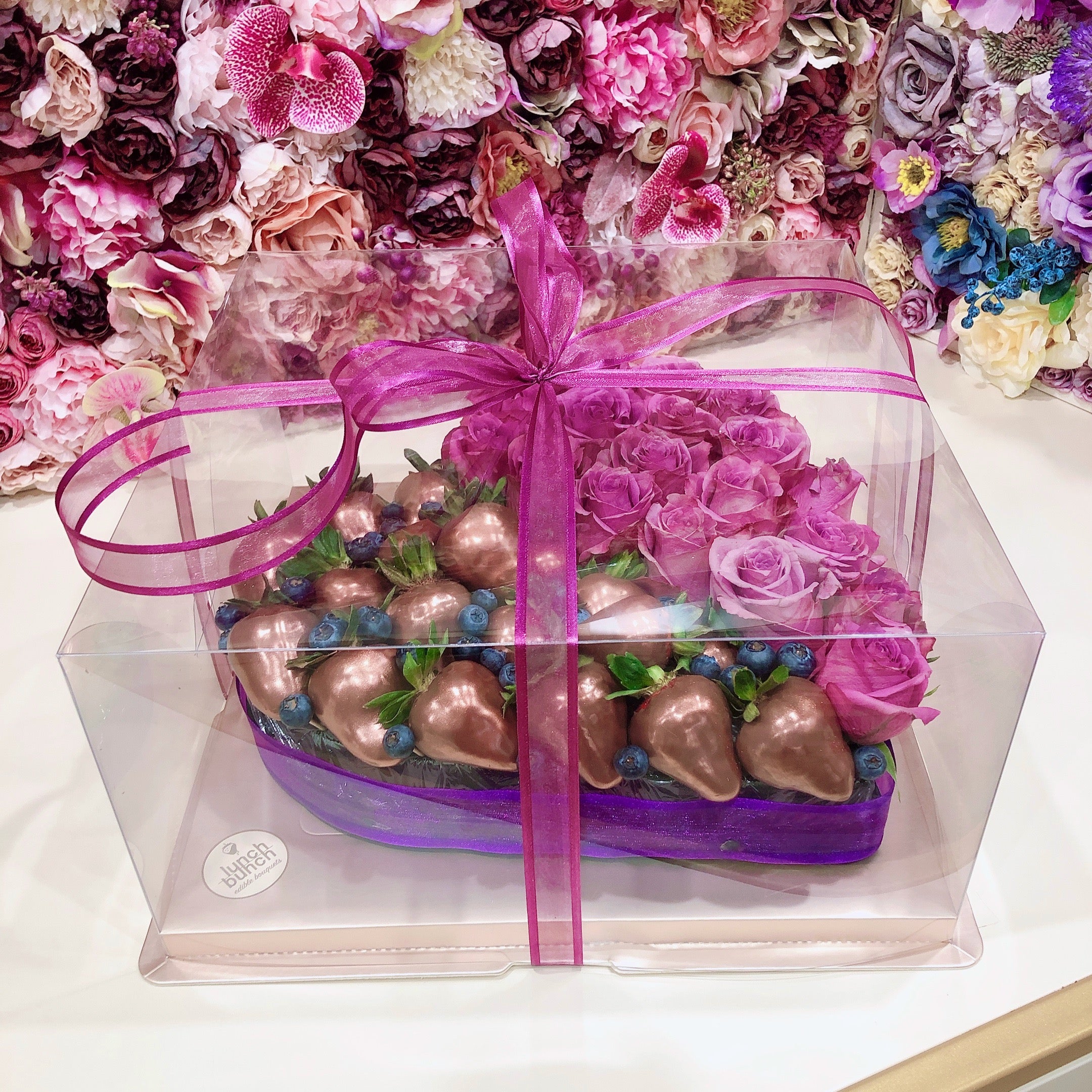 Dozen of roses in love heart box with chocolate covered strawberries for romantic gift same day delivery
